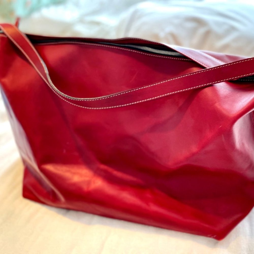 Red genuine leather overnight bag